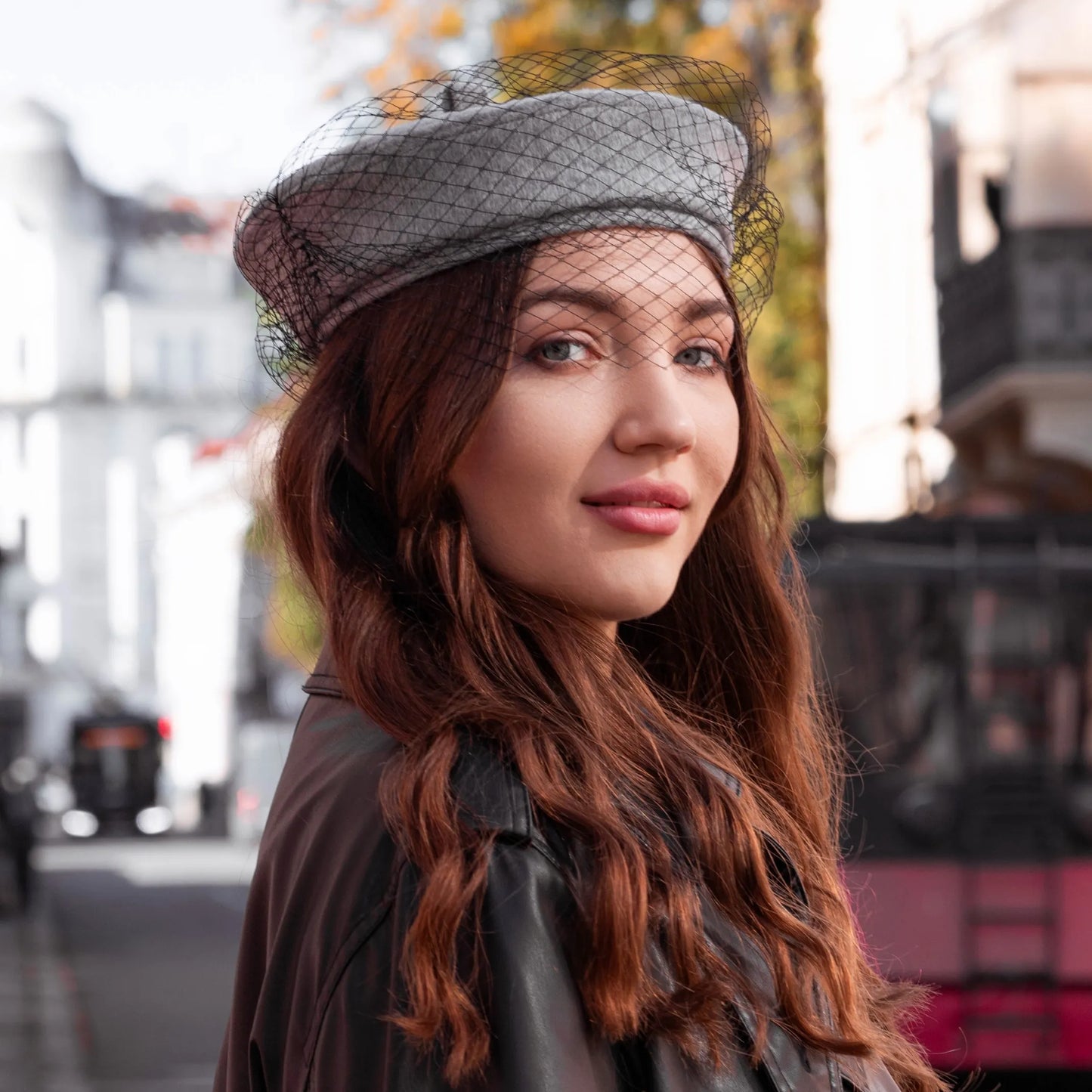 Grey beret with a black veil