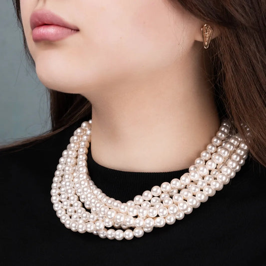 Transformer choker with 6 rows of ivory pearls