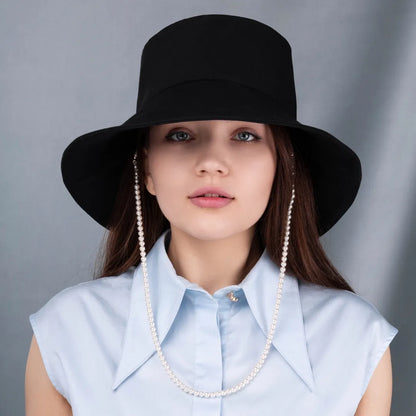 Panama hat with a pearl chain