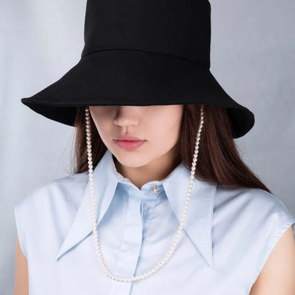 Panama hat with a pearl chain