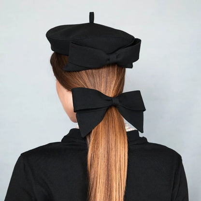 Suit fabric beret with a bow