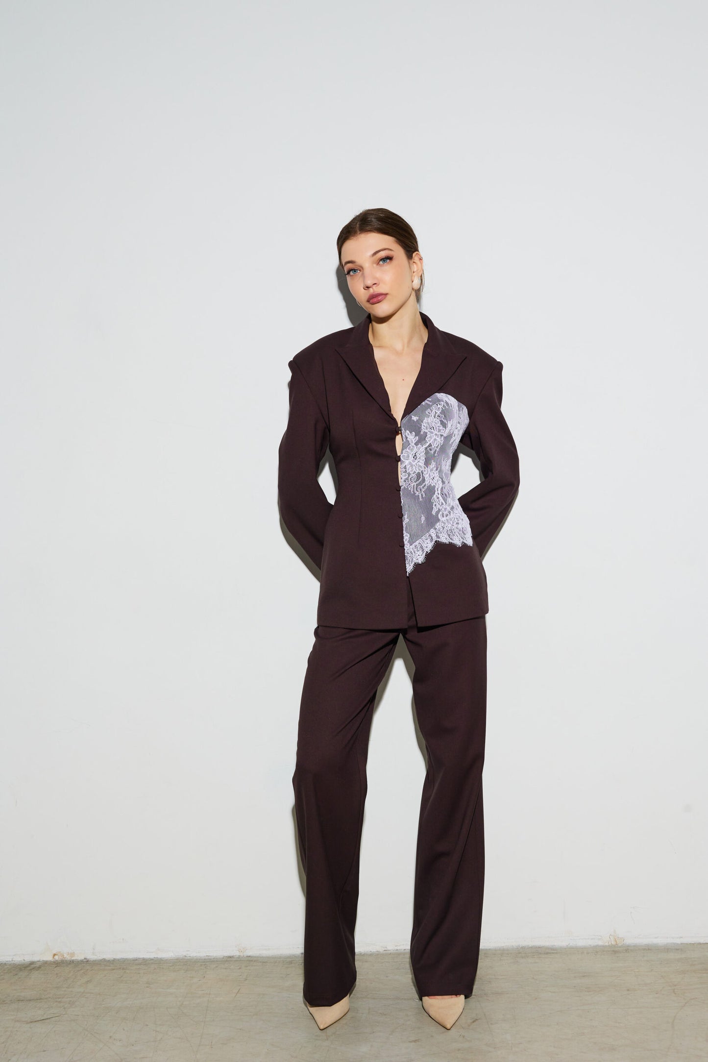 Jacket embellished with chocolate lace corset