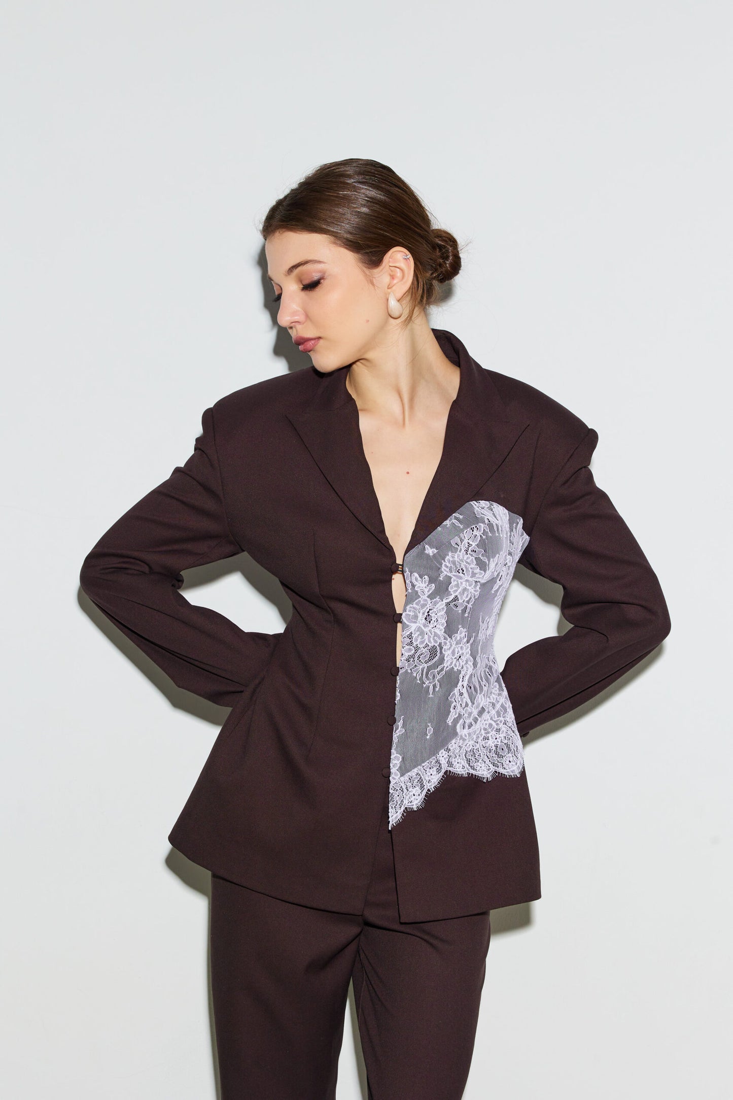 Jacket embellished with chocolate lace corset