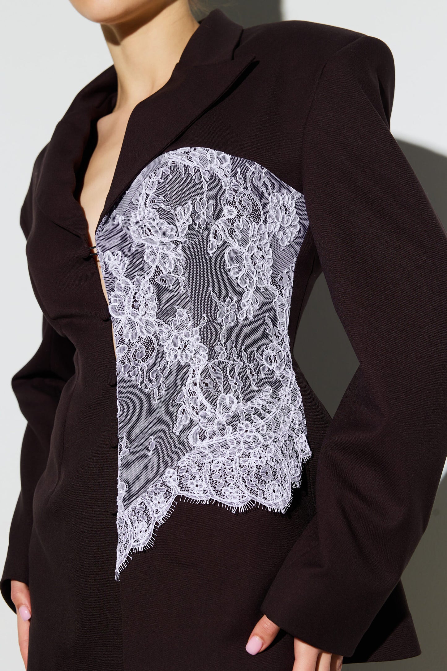 Jacket embellished with chocolate lace corset