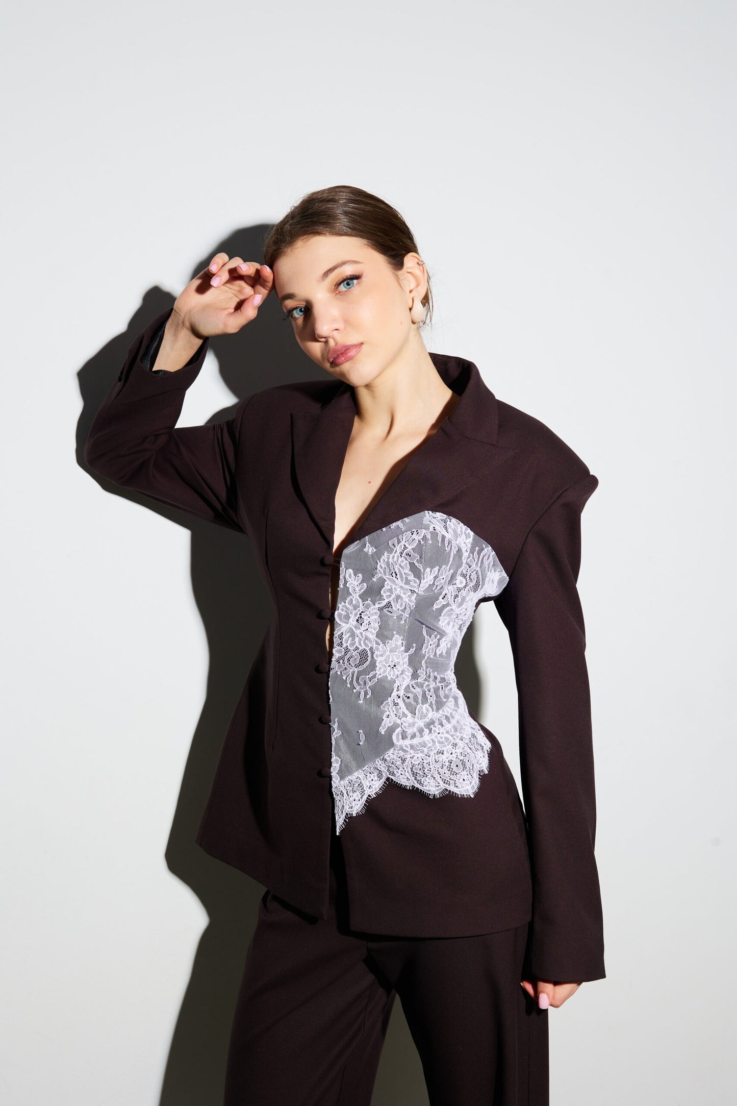 Jacket embellished with chocolate lace corset